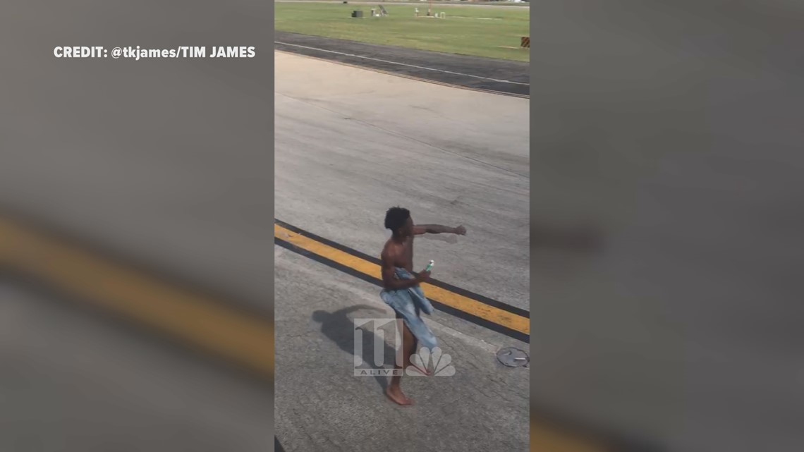 Photos Half Naked Man Runs Onto Airport Tarmac Rushes Delta Plane