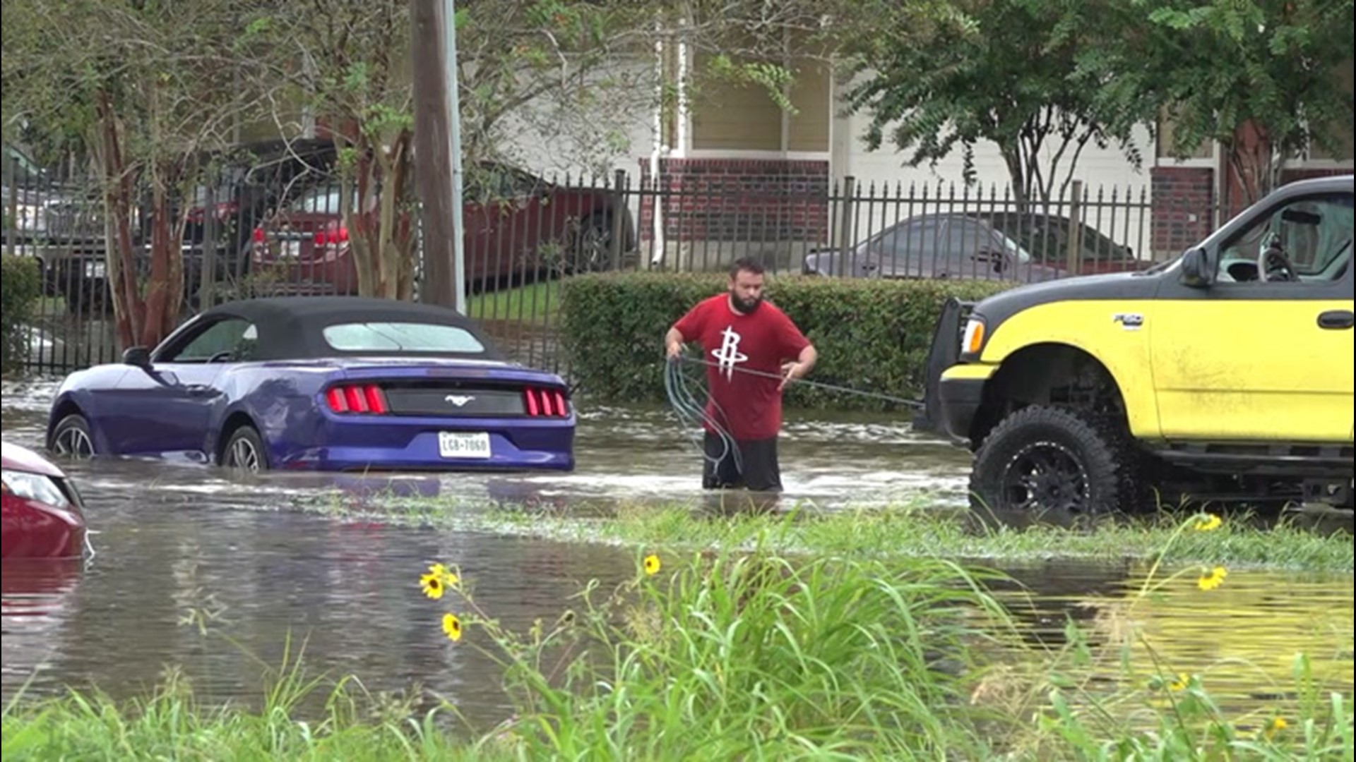 Volunteers in specially equipped vehicles helped those in need as Beta caused flooding in Houston, Texas, on Sept. 22.