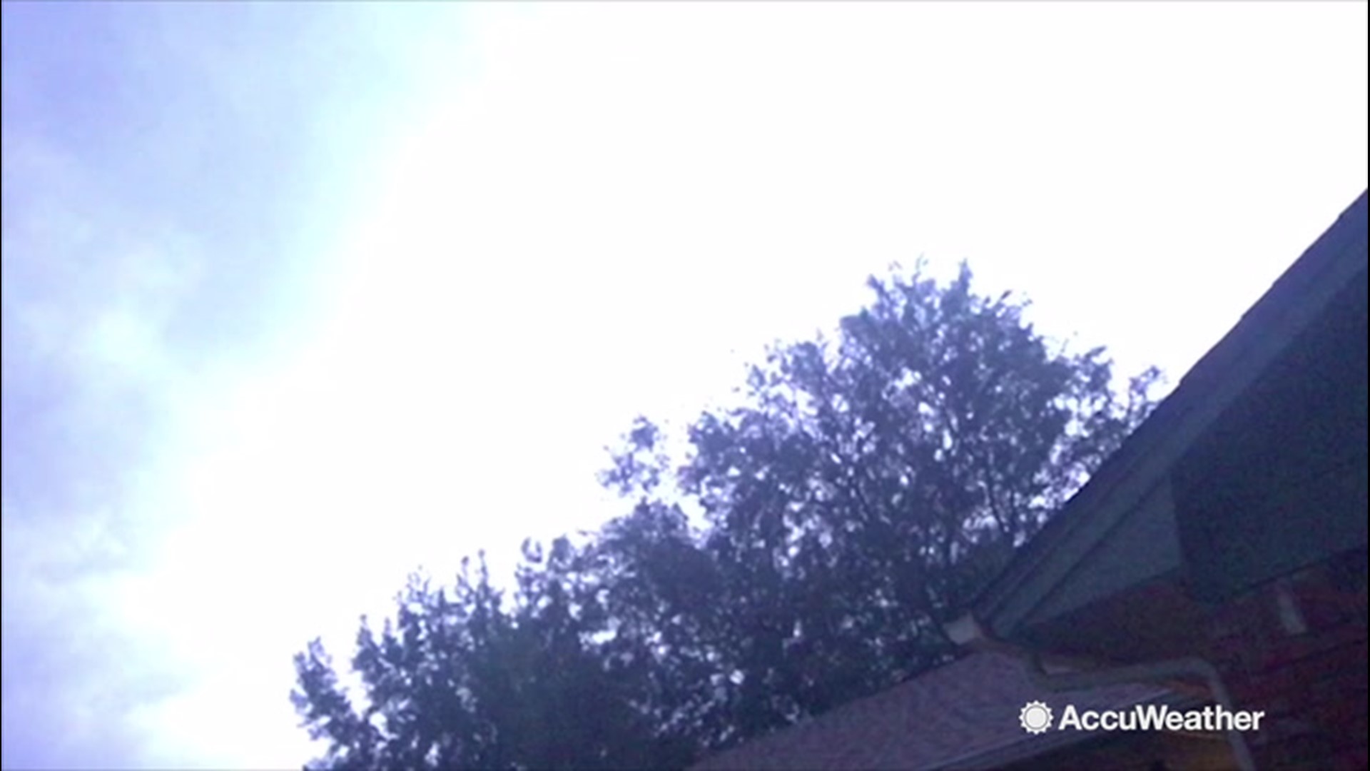 Storm chaser Gage Shaw recorded as lightning flickered across the night sky in Norman, Oklahoma, on Aug. 25.