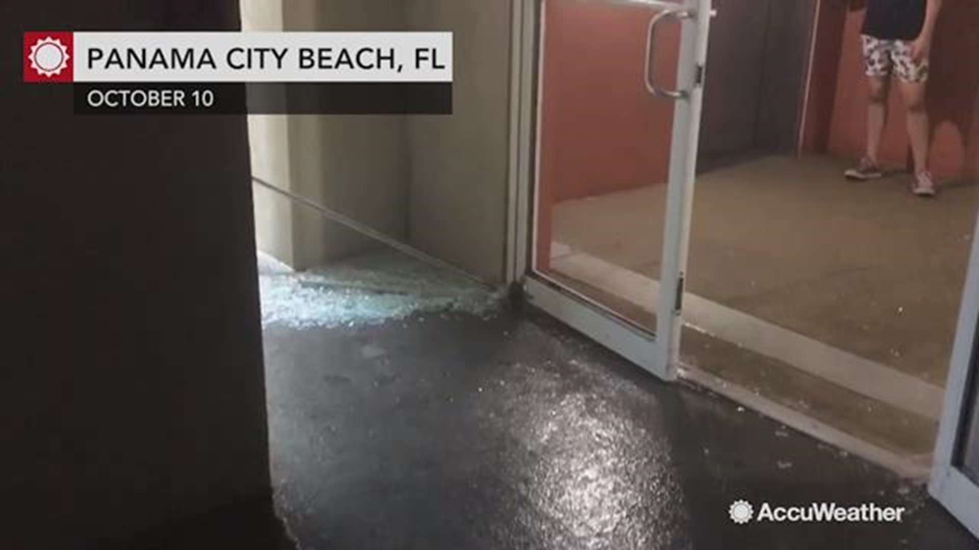 These condo doors were blown open by Hurricane Michael's ferocious winds causing shattered glass shards to fly through the air in Panama City Beach, Florida.