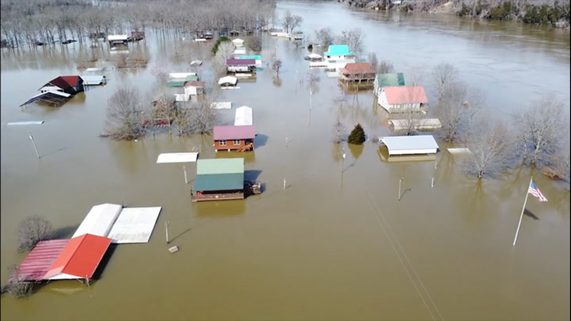Video posted on Feb. 16 shows lines of homes swamped by floodwaters. Aerial video was recorded in Hardin County, Tennessee.
