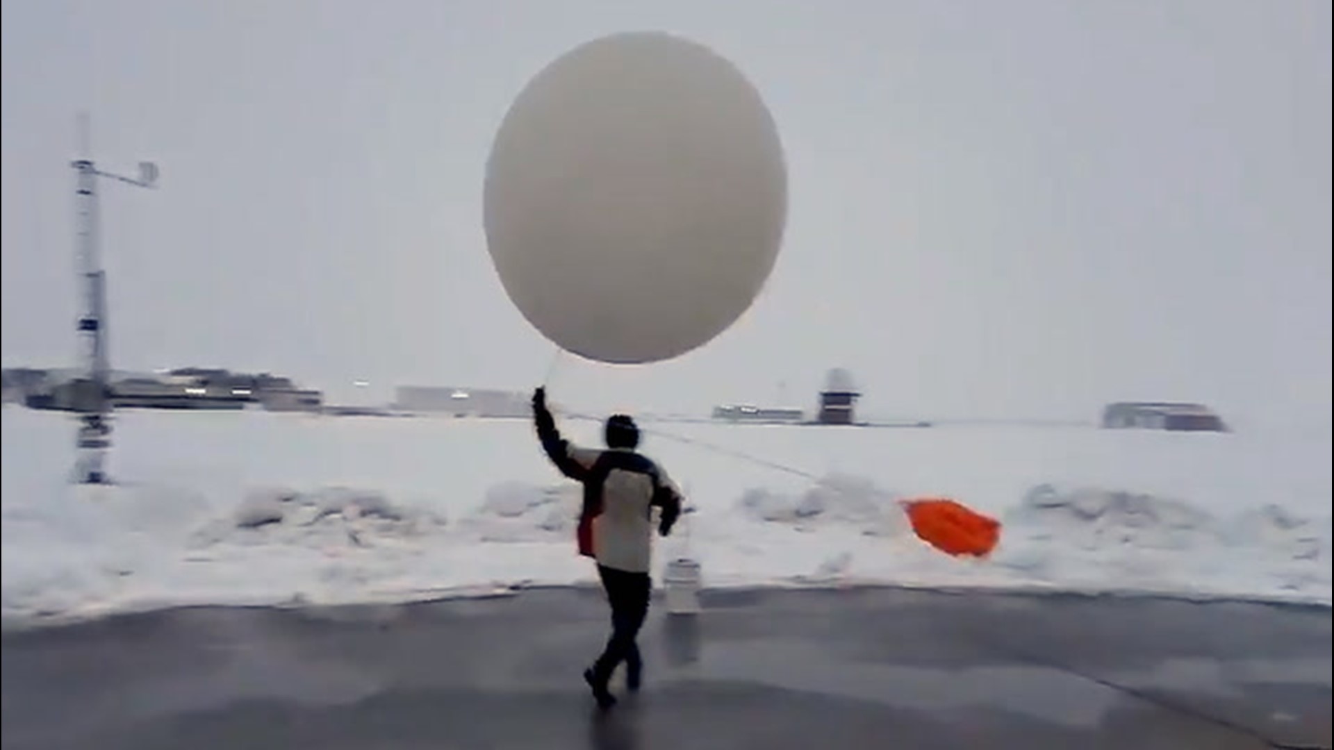 As a winter storm brought snow, heavy at times, to Iowa on Jan. 25, it was up to one National Weather Service worker to brave the blustery conditions and launch a weather balloon.