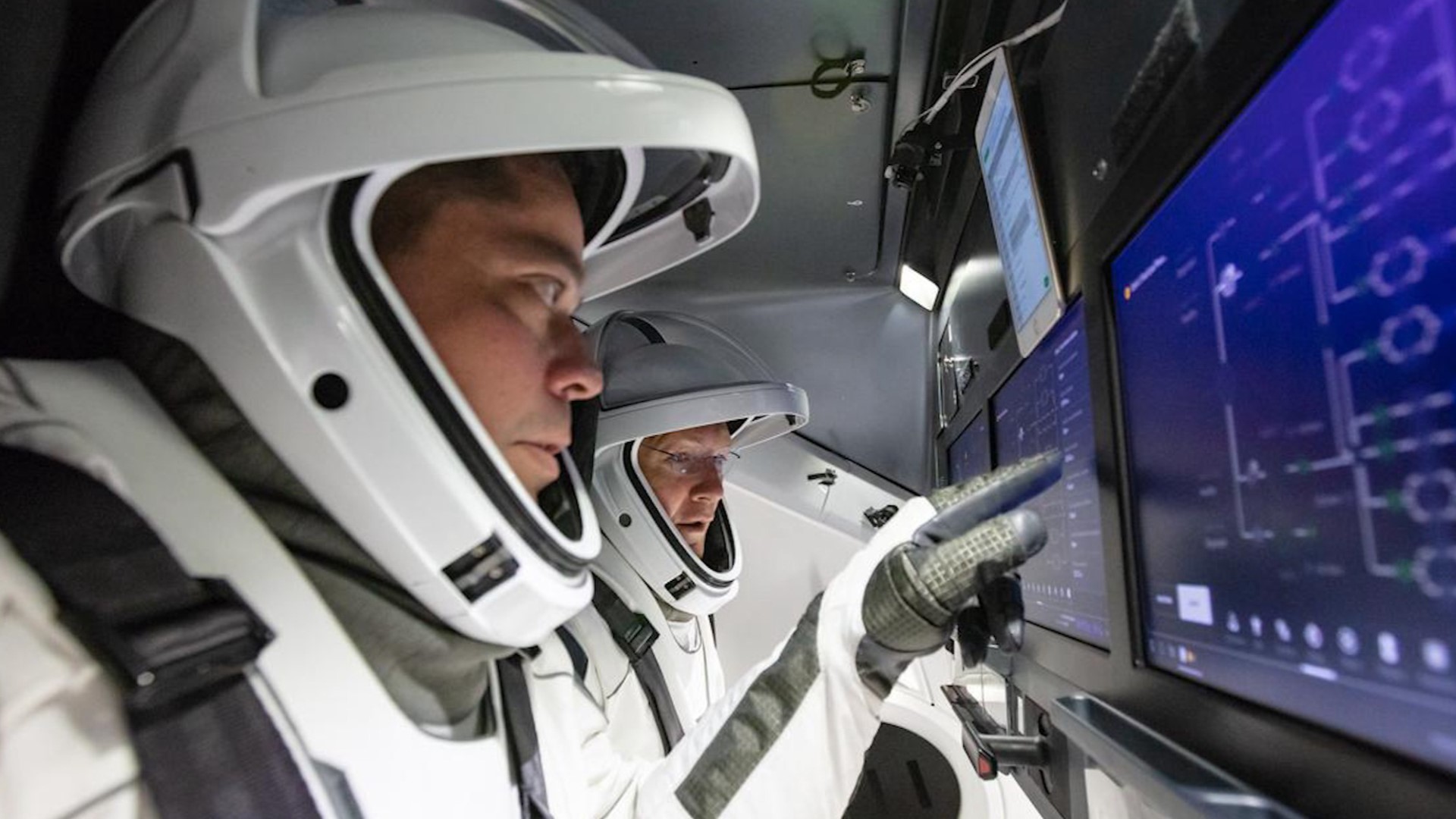 A SpaceX official says the first crewed mission from U.S. soil since 2011 may be postponed if the skies aren't clear and Atlantic ocean calm from Florida to Ireland on launch day, noting it wouldn't be unusual for this time of year.