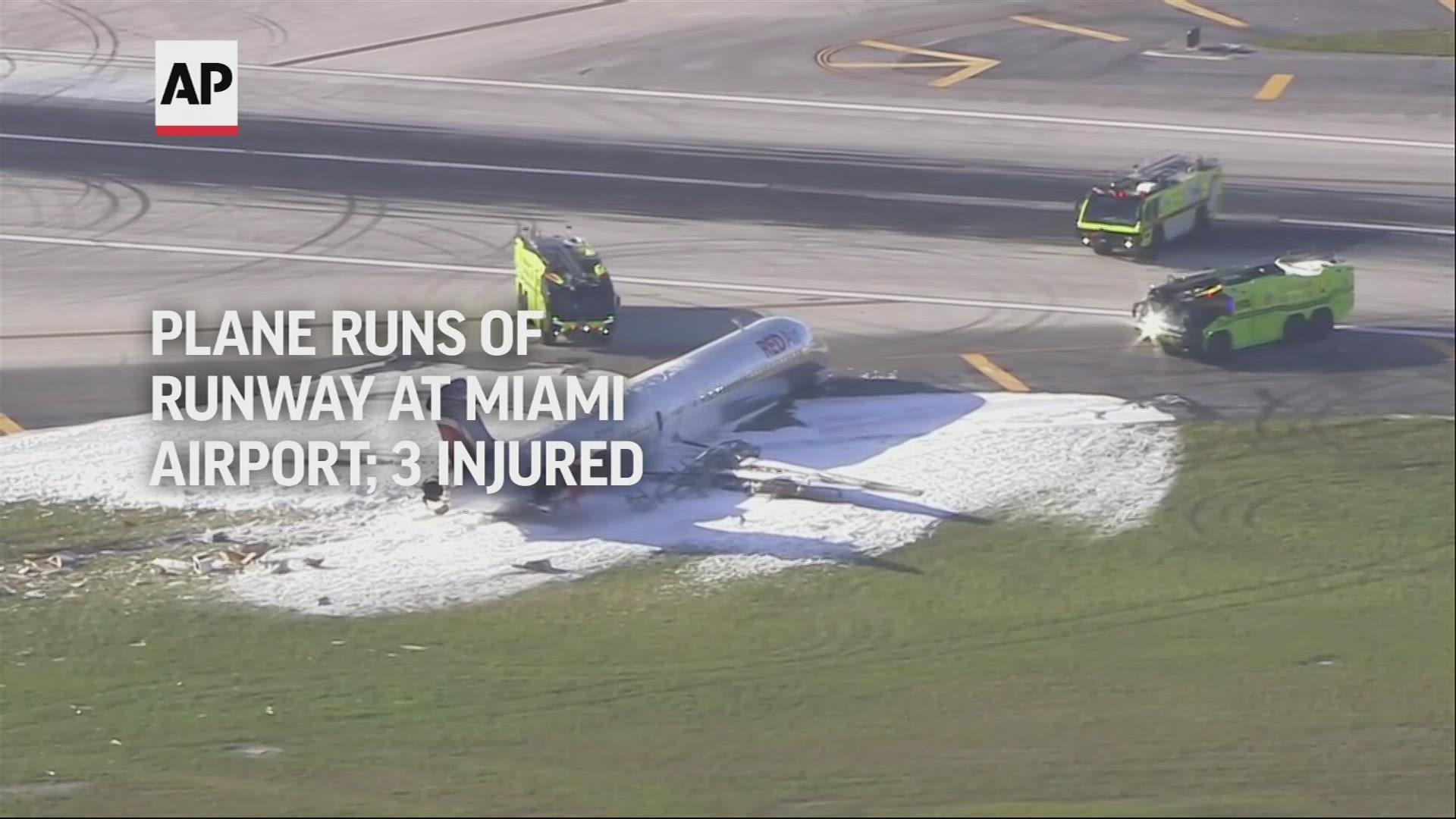 Officials say a passenger airplane caught fire after landing at Miami International Airport, though no serious injuries were reported.