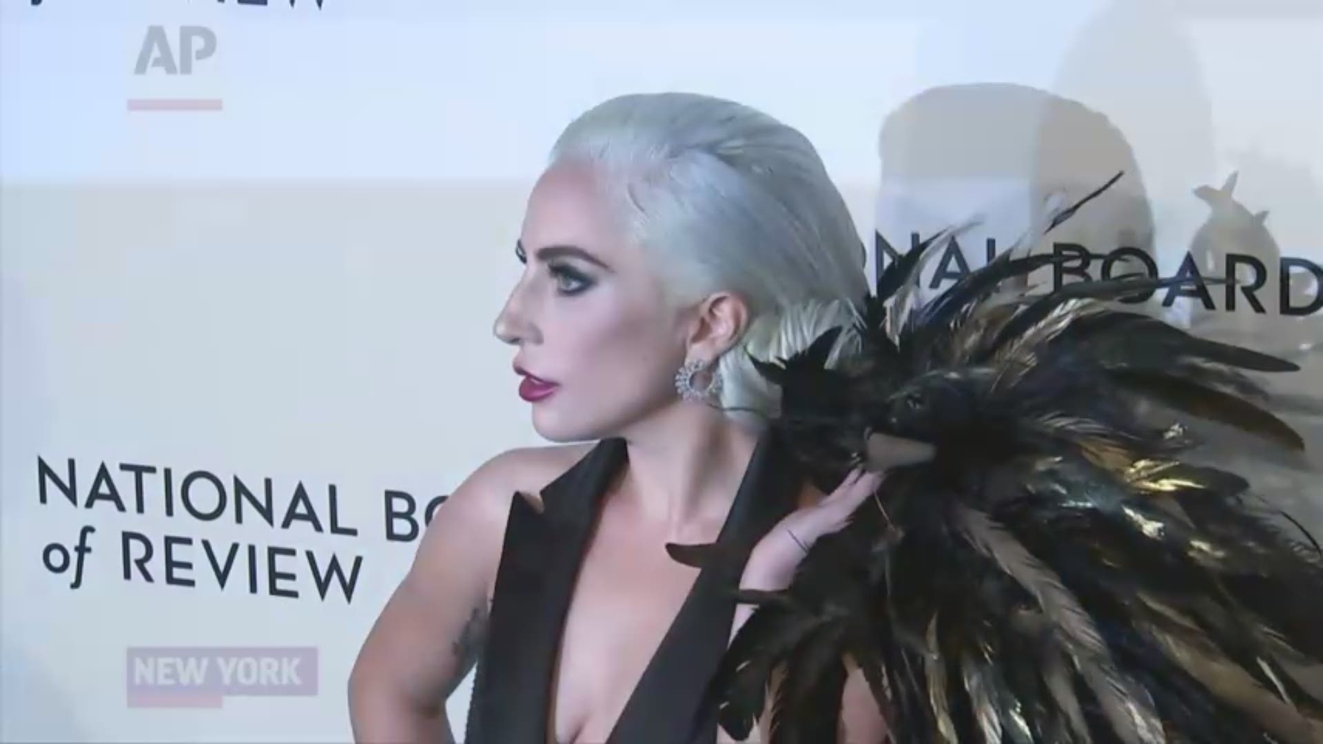 At the National Board of Review awards, best actress winner Lady Gaga talks about re-opening old wounds to appear in "A Star is Born" and Bradley Cooper reveals what pushed him to direct the drama, while Viggo Mortensen shares his misgivings before signing up for "Green Book." (AP)