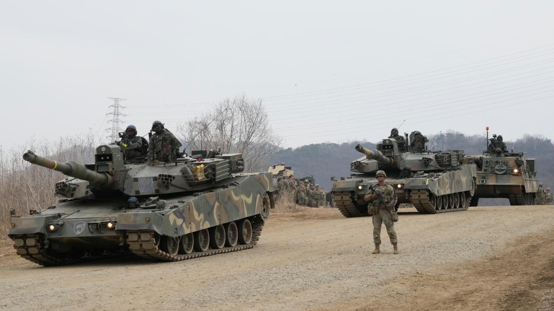 North Korea fires about 10 missiles toward sea in show of force, South Korean officials report