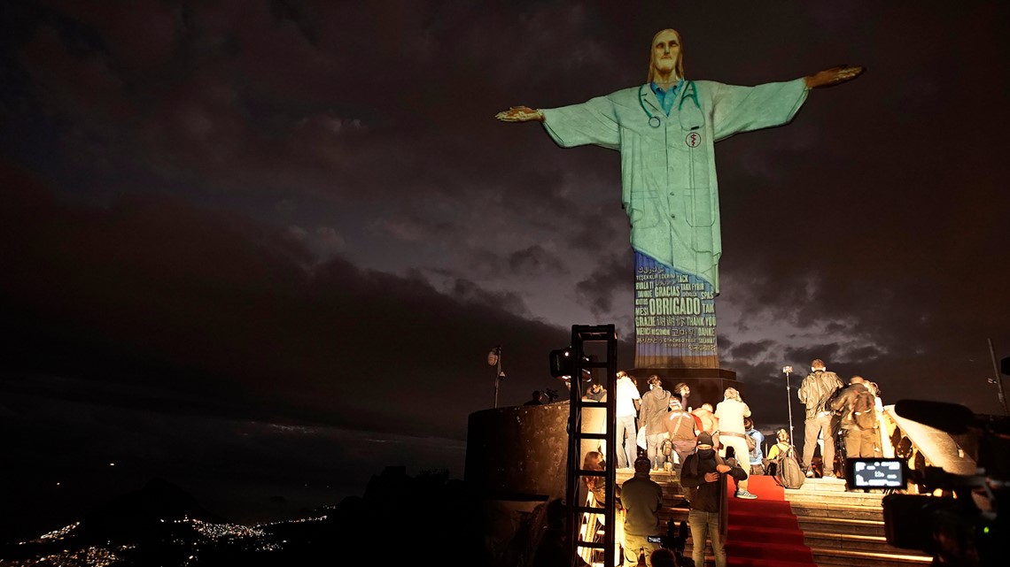Rio's Christ the Redeemer lit up as doctor in Easter tribute