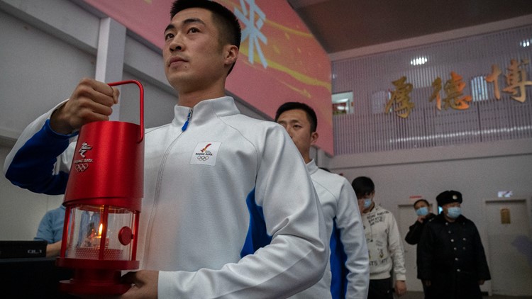 Winter Olympics: Torch relay confined to closed venues amid COVID concerns