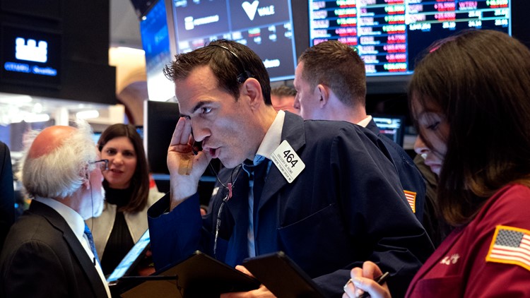 Stocks end higher on Wall Street even after late-day stumble