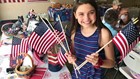 Rochester teen honors her late father with flags