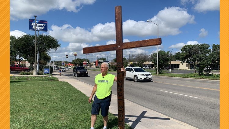 'There are people that love them': Uvalde County EMT carries cross to support students returning to school