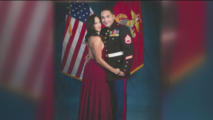 Married military veterans graduate together with finance degrees