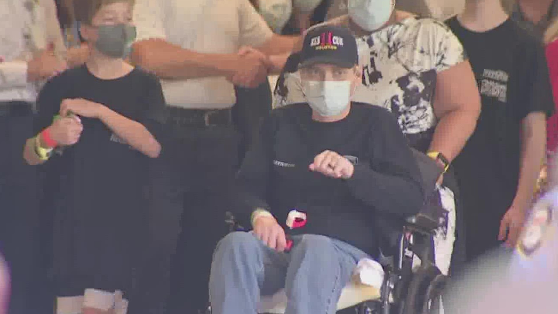 Houston firefighter Wayne Davis released from hospital Friday. He was met with a cheering crowd of family, friends and doctors at Memorial Hermann Hospital.