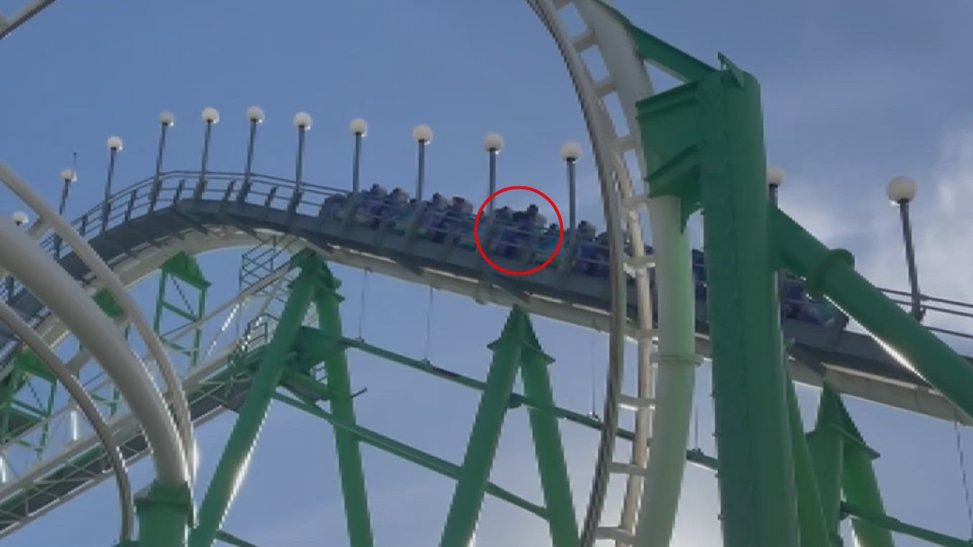 An Arizona man said he climbed out of a moving roller coaster after the safety bar became unlatched.