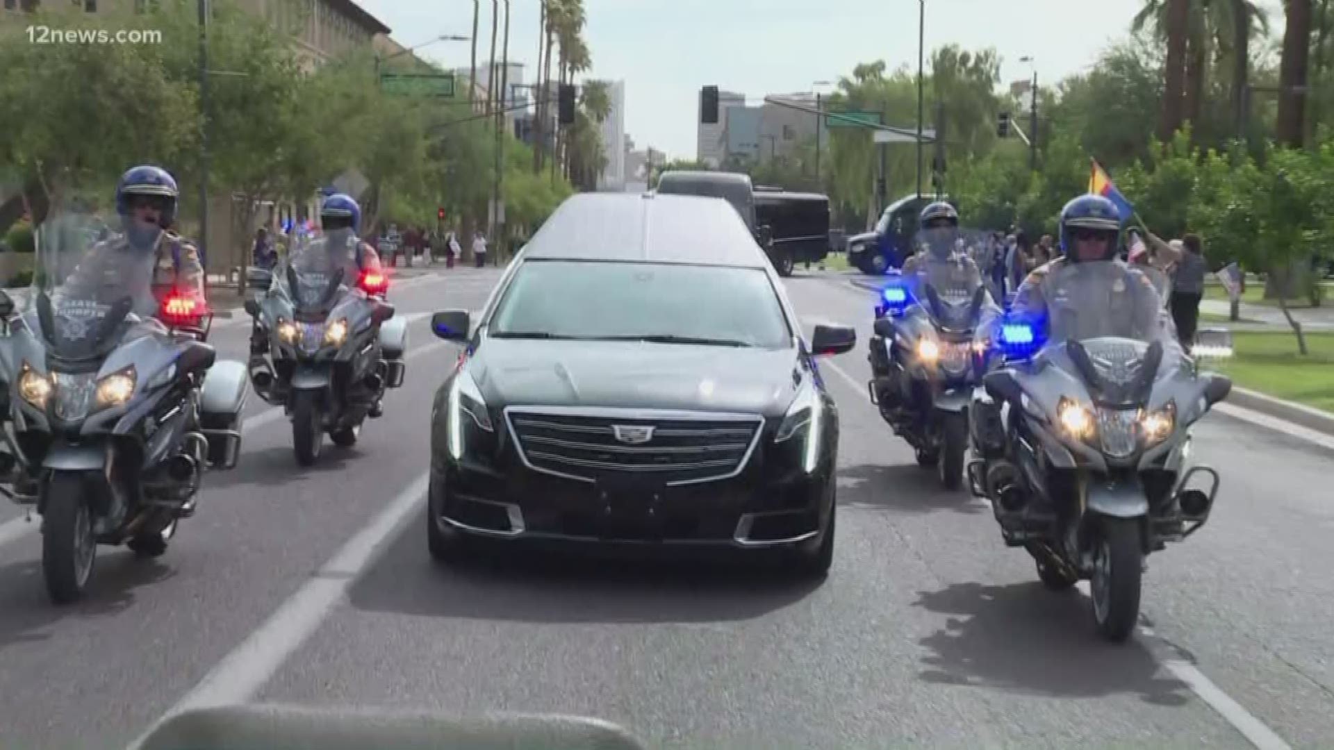 Dougg Ducey speaks with Mark Curtis about the celebration of life and legacy of John McCain during the procession to North Phoenix Baptist Church with rolling closures.