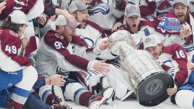 Avs dent Stanley Cup during on-ice celebration