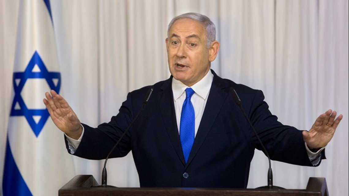 Netanyahu indicted in court on corruption charges after dropping