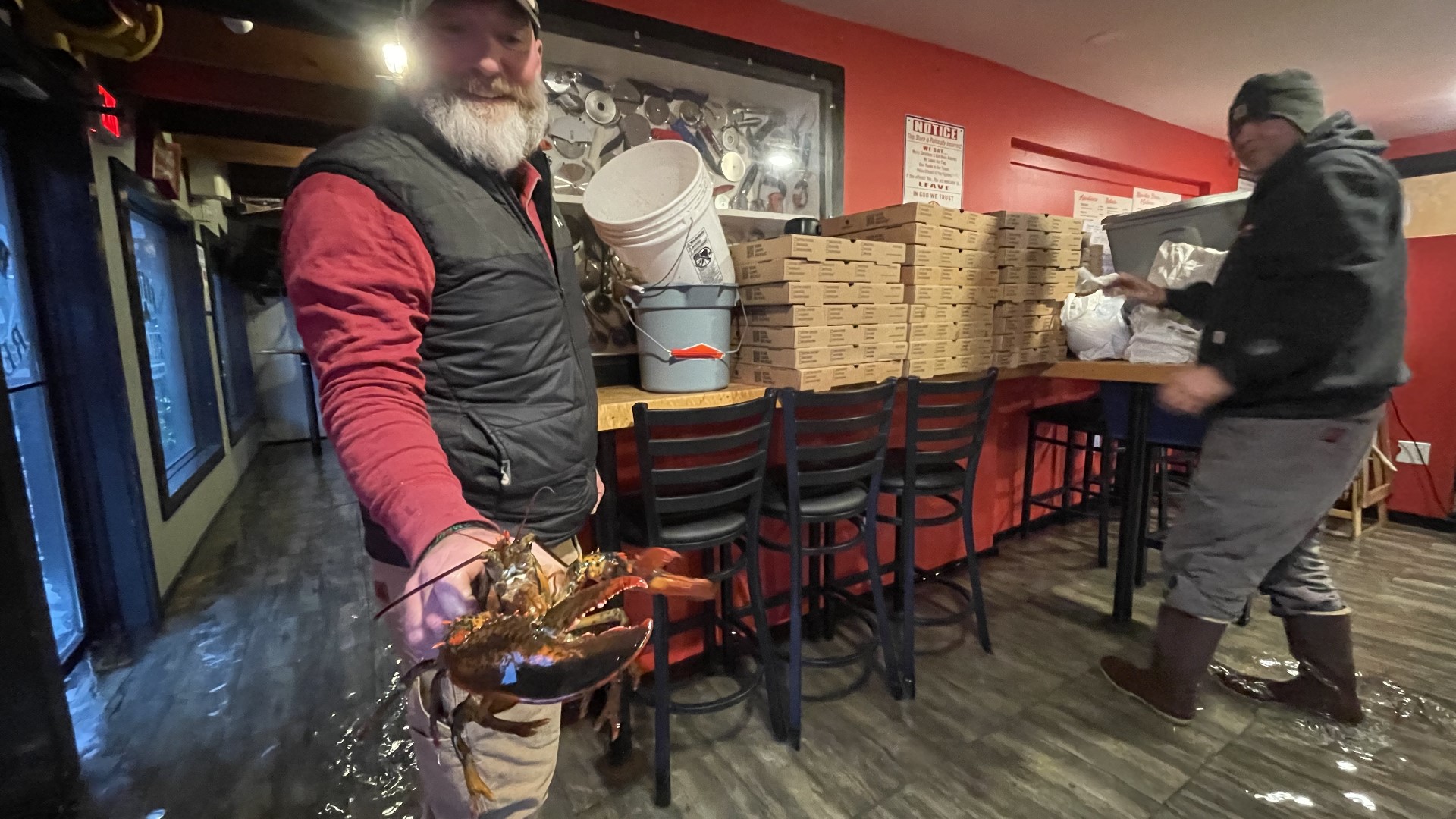 Pier 1 Pizza in Boothbay Harbor flooded during the storm Saturday, but the workers there made the most of it.