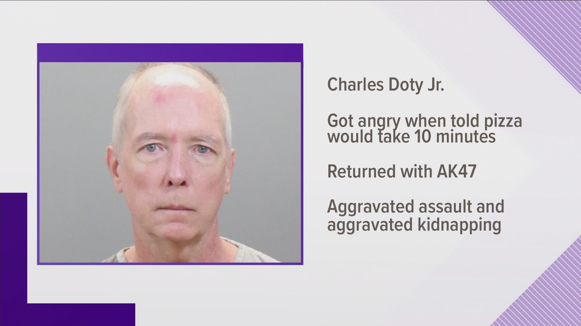 Knoxville Police said when Doty heard his Little Caesars pizza would take 10 minutes, he threatened employees with a rifle.