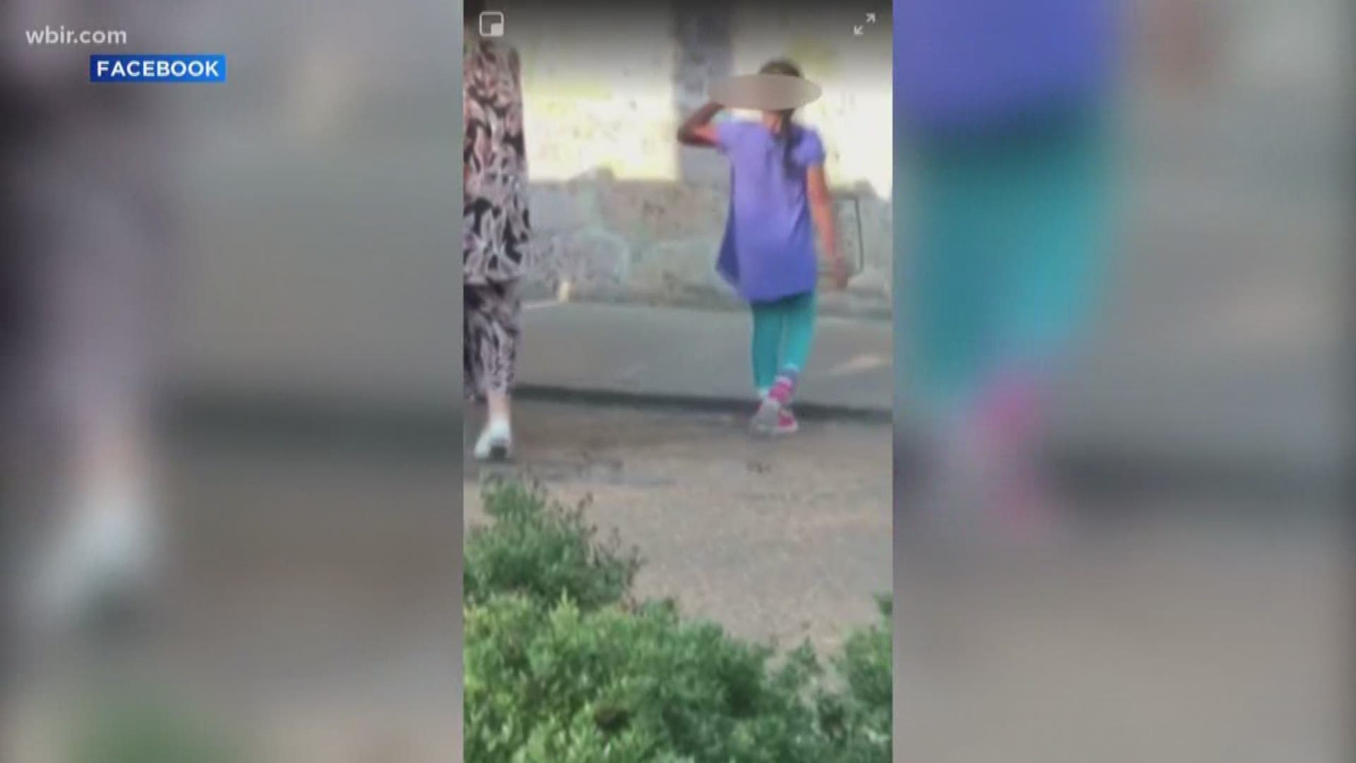 A Memphis woman was caught on camera as she appeared to let a child out of a pet kennel.