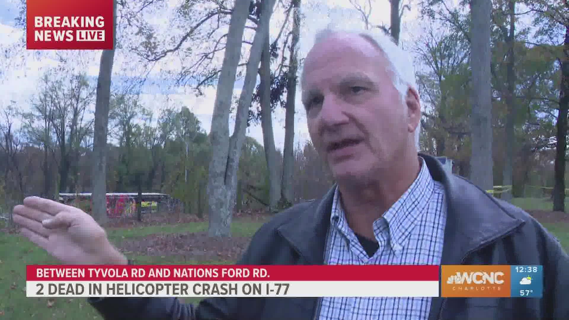 Two people were killed in a helicopter crash along I-77 in south Charlotte Tuesday afternoon.