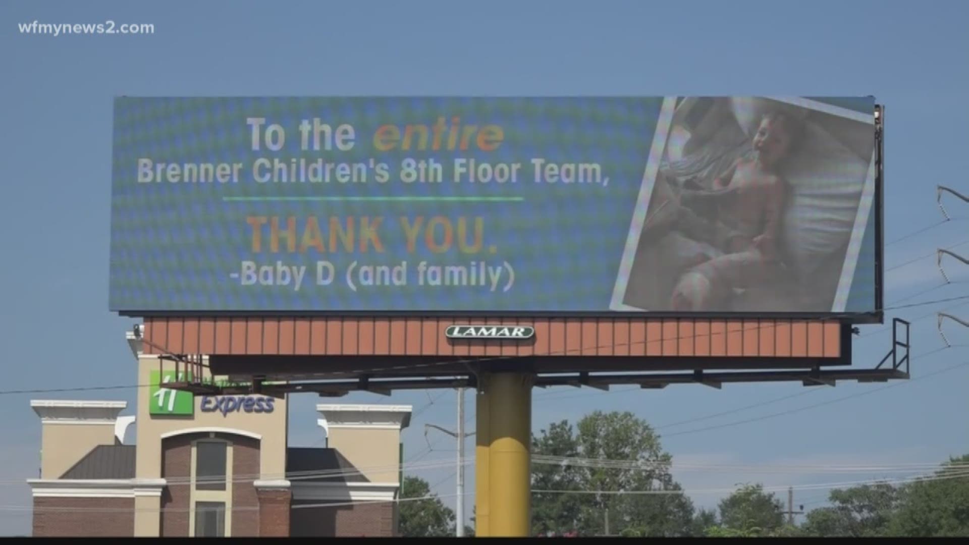 You can see the billboard driving east down business 40 near Brenner Children's Hospital.