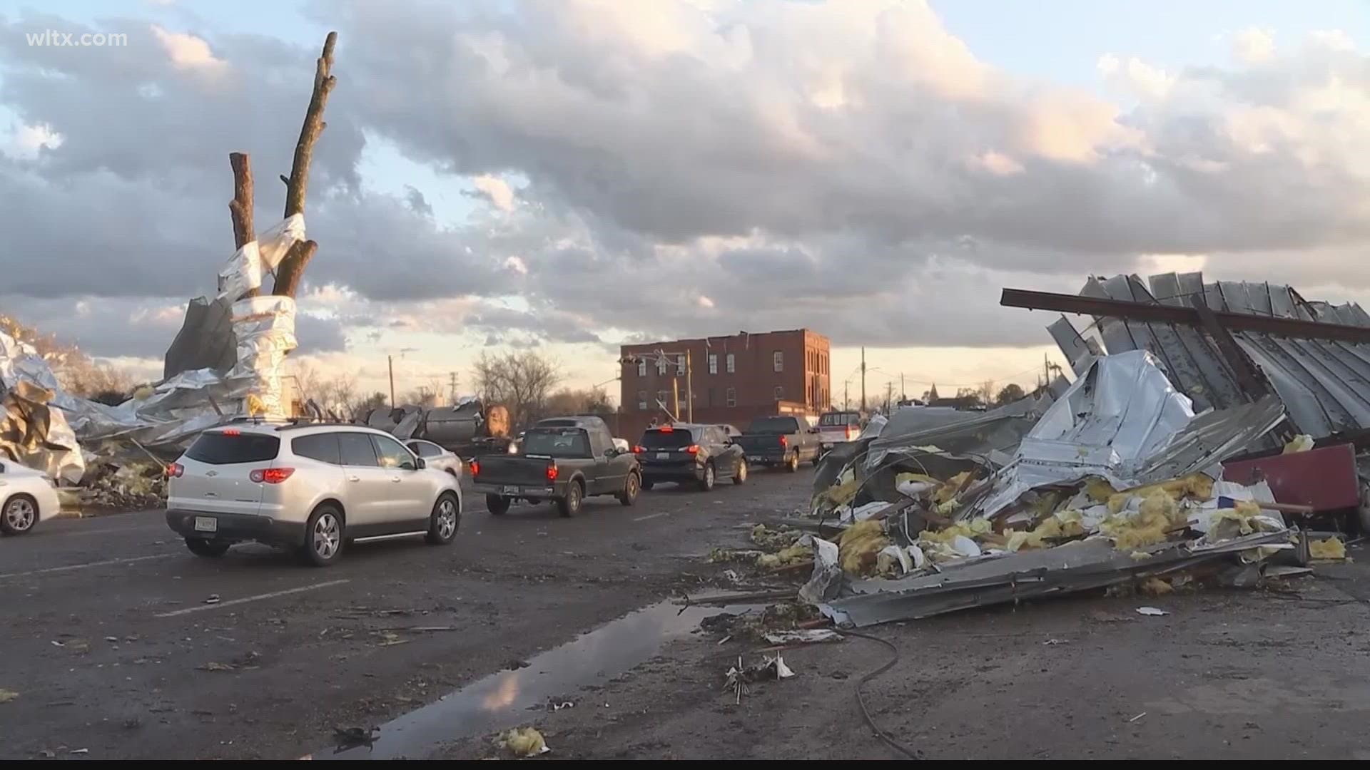 A massive storm system whipping up severe winds and spawning tornadoes cut a path across the South Thursday, killing at least seven people in Georgia and Alabama.