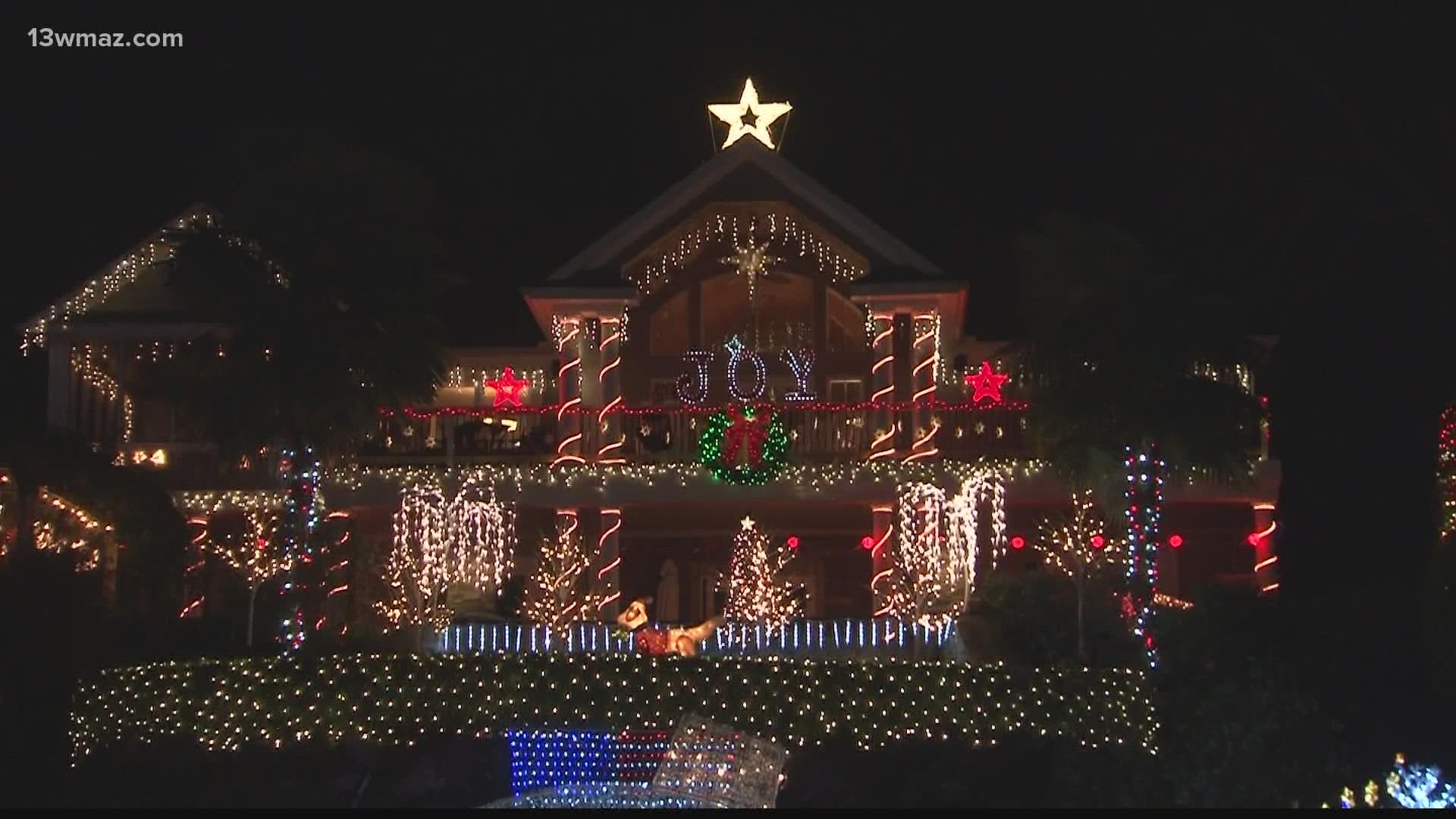 Boat houses have been transformed into a winter wonderland, fully decked out in fun Christmas lights.