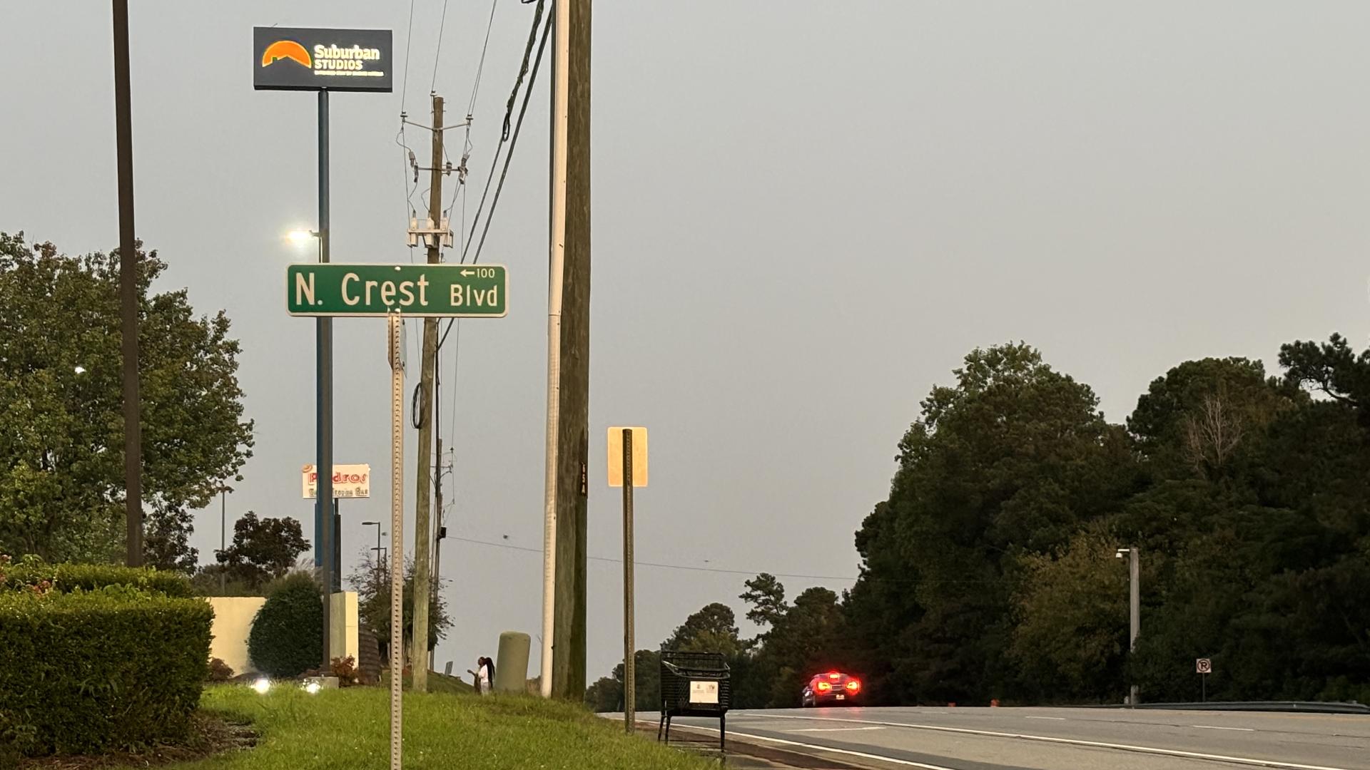 Cars zoom down Riverside Drive hours after a boy was killed by a passing car.