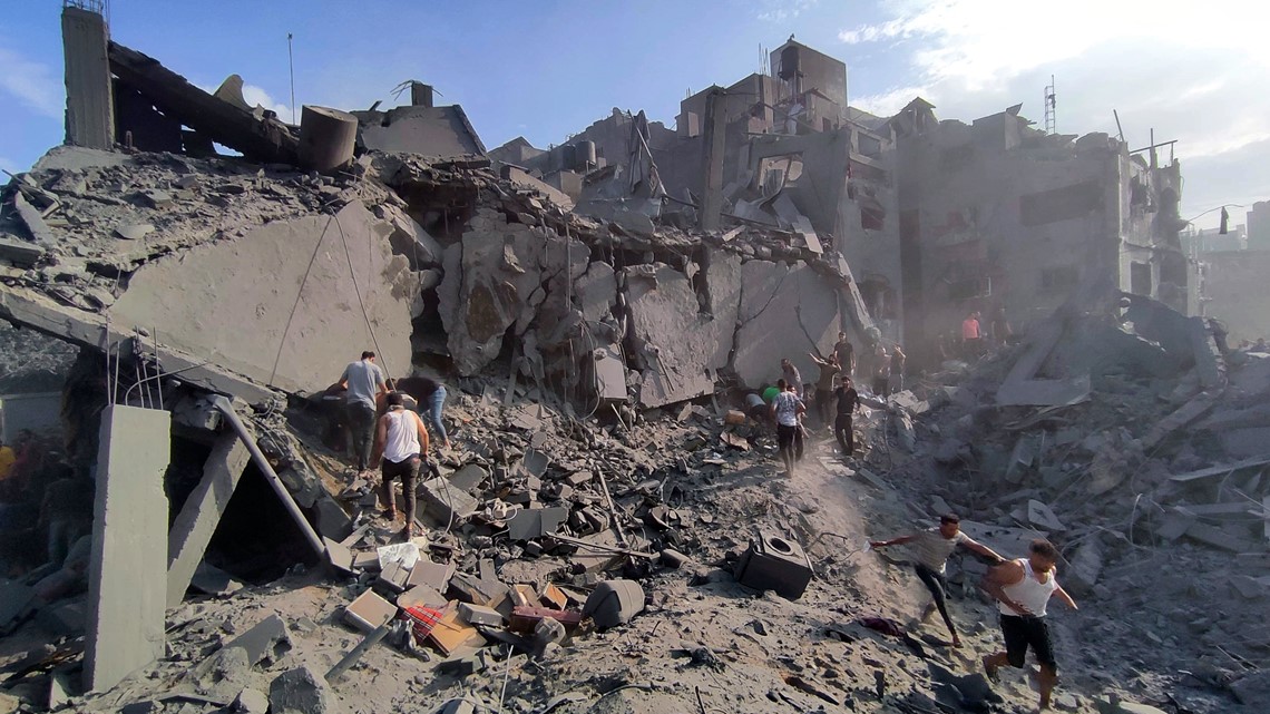 Israeli airstrike demolishes apartments in Gaza refugee camp | 11alive.com