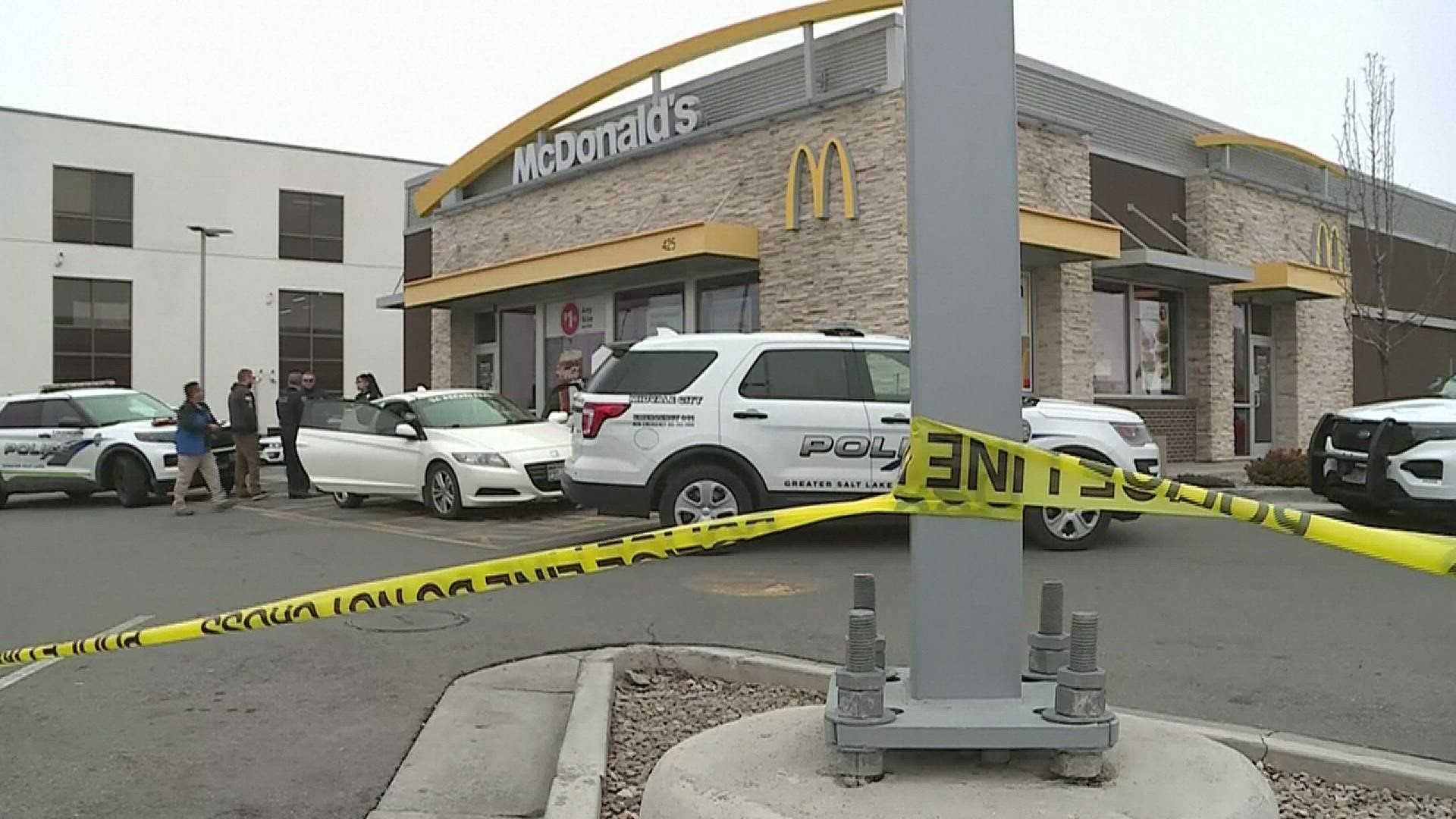 Investigators believe a man told his 4-year-old child to fire at officers following a dispute over his order at a McDonald's drive-thru in suburban Salt Lake City.