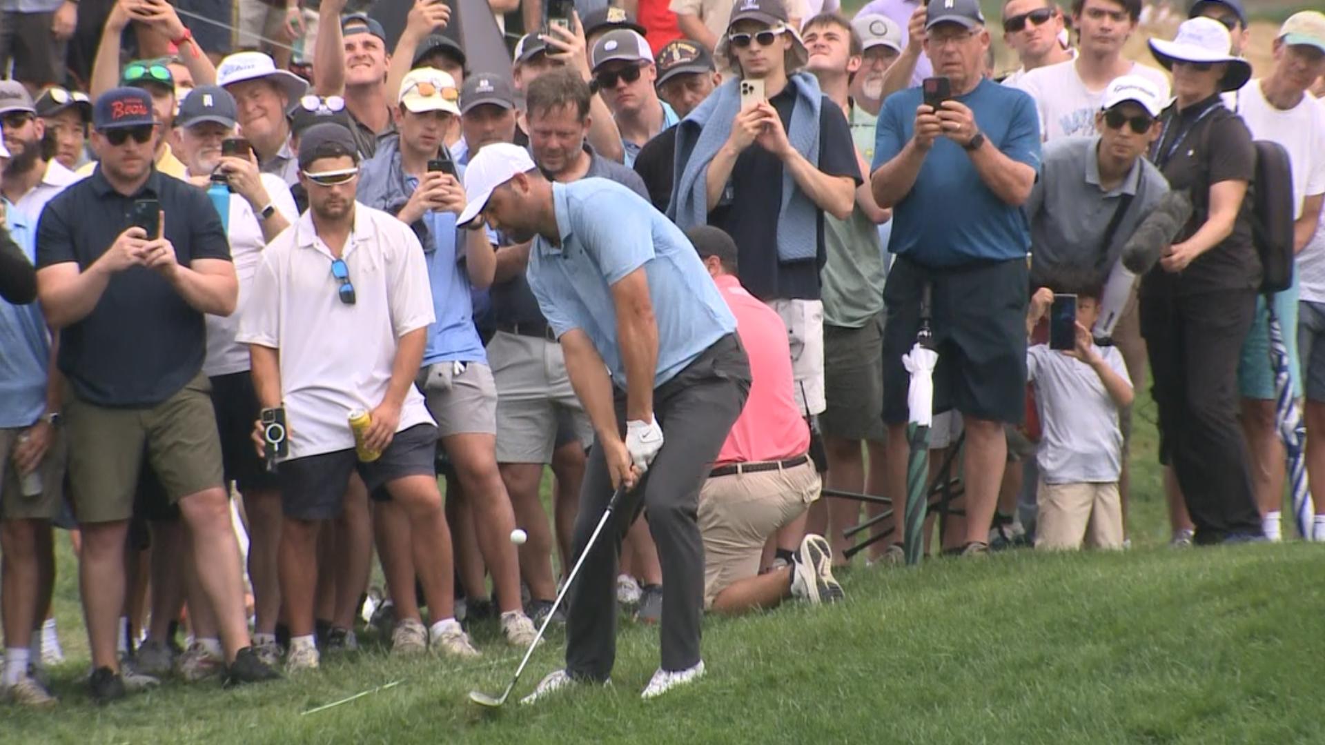 On the final day of the 2024 Travelers Championship, the world's top-ranked golfer Scottie Scheffler narrowly escapes a tight spot.