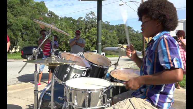 Community helps Brunswick teen trade buckets for drum set