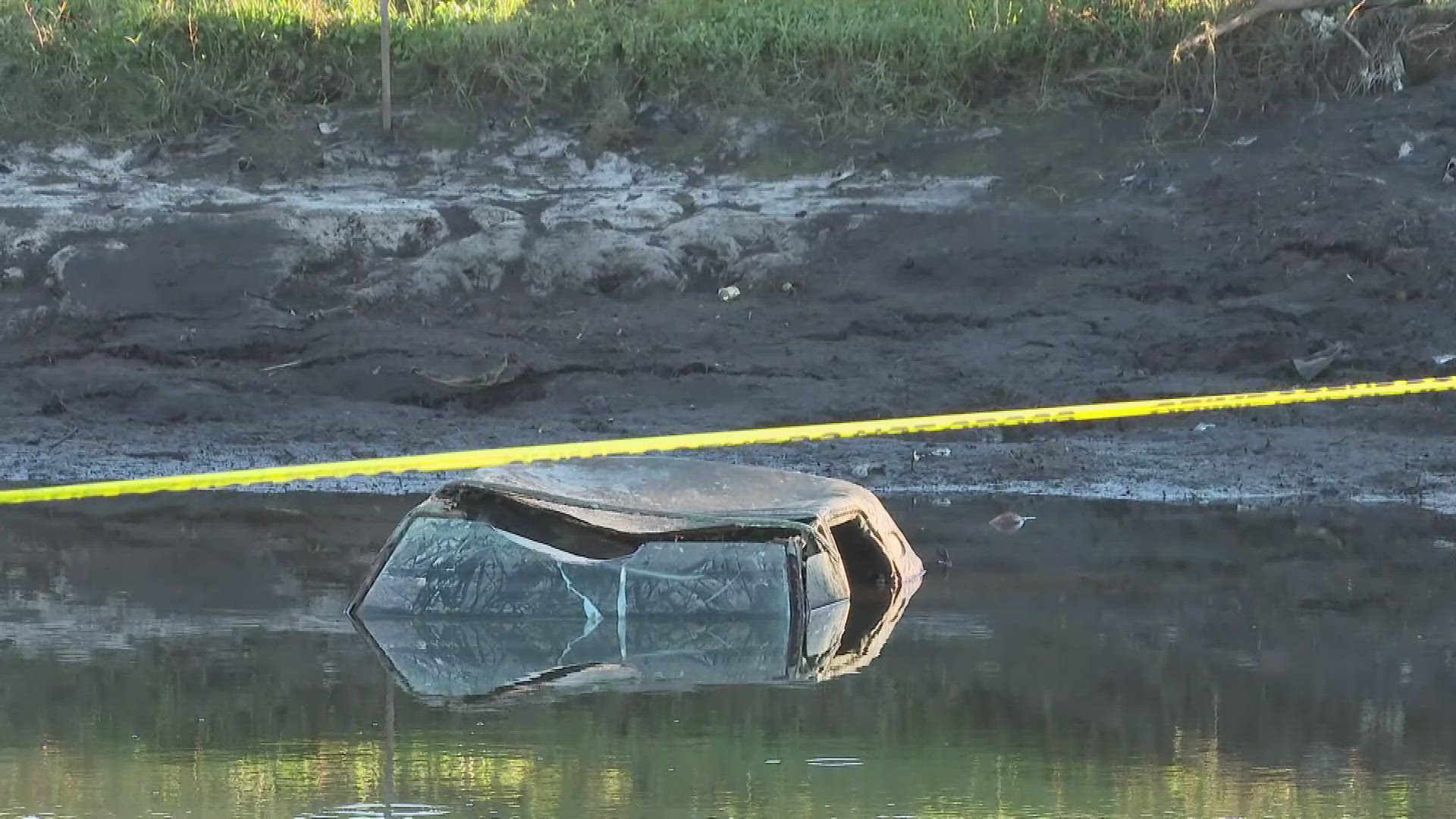 A human bone was found inside a car inside the pond.