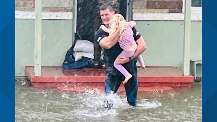 'She'll have a little piece of my heart forever': Florida firefighter rescues little girl during Hurricane Ian.