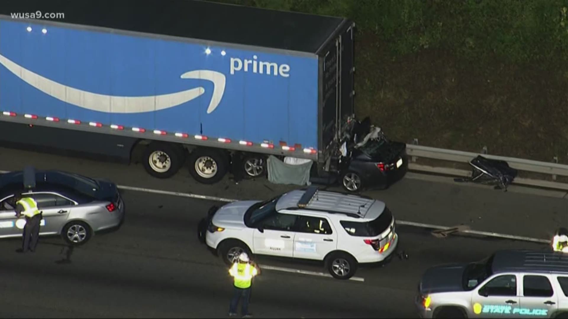 Two lanes are closed on I-95 South near Lorton Road in Virginia after a car went under an Amazon Prime tractor trailer Wednesday morning.