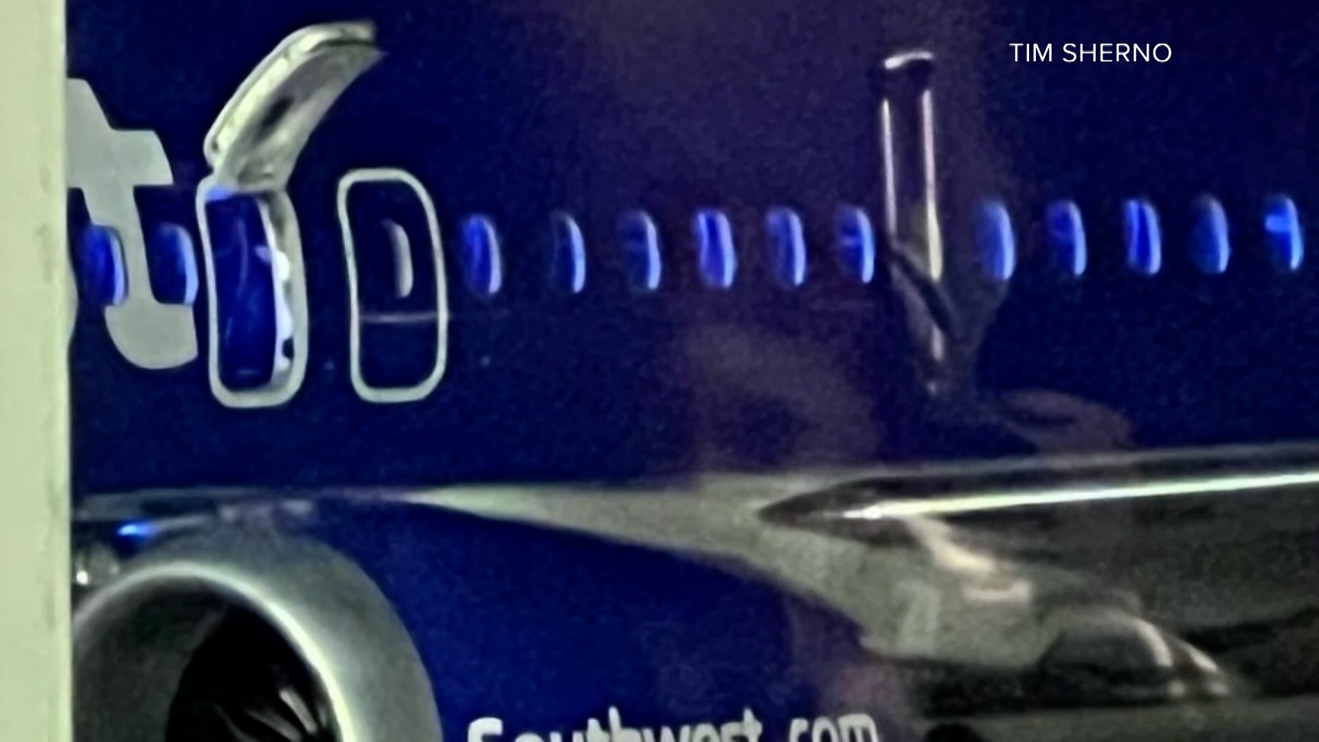 Passengers say they saw a man open the emergency door on a Southwest flight Sunday evening.