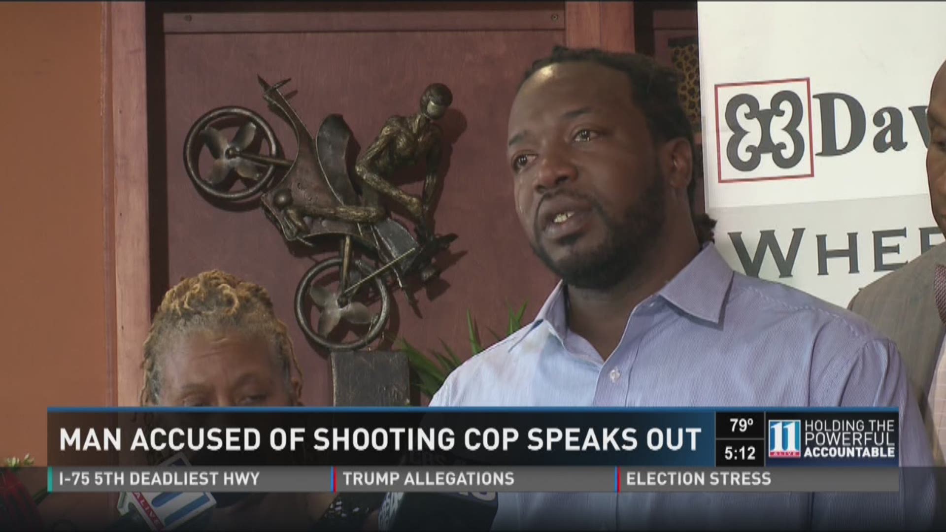 Man accused of shooting cop speaks out