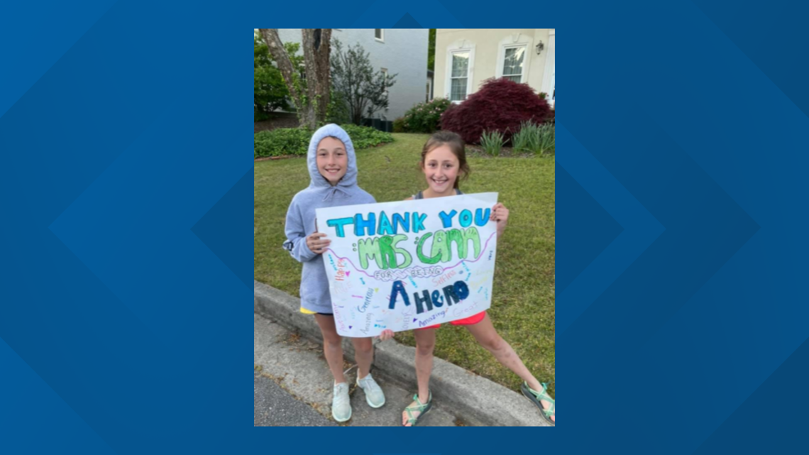 Dunwoody neighbors hold surprise parade for nurse Megan Cann