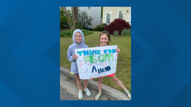 Neighbors thank organizer with surprise parade after COVID-19