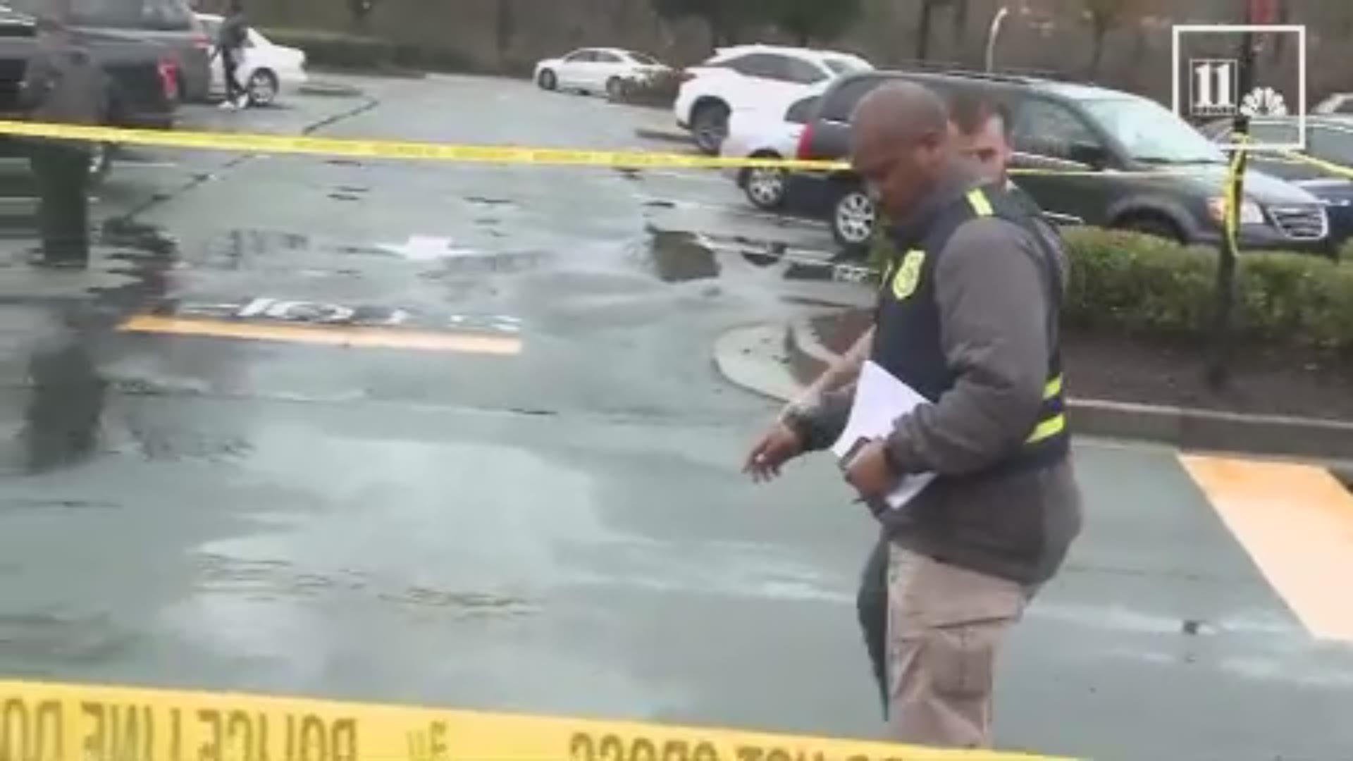 Police investigate at the Camp Creek Marketplace on Dec. 28, 2018.