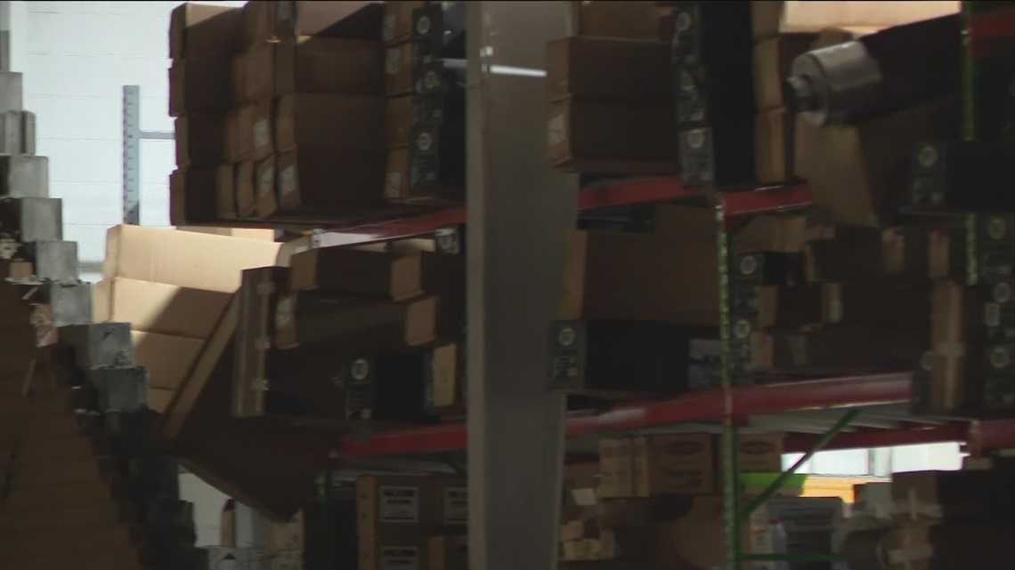 Warehouse wall destroyed in Austell storm, homes hit by trees