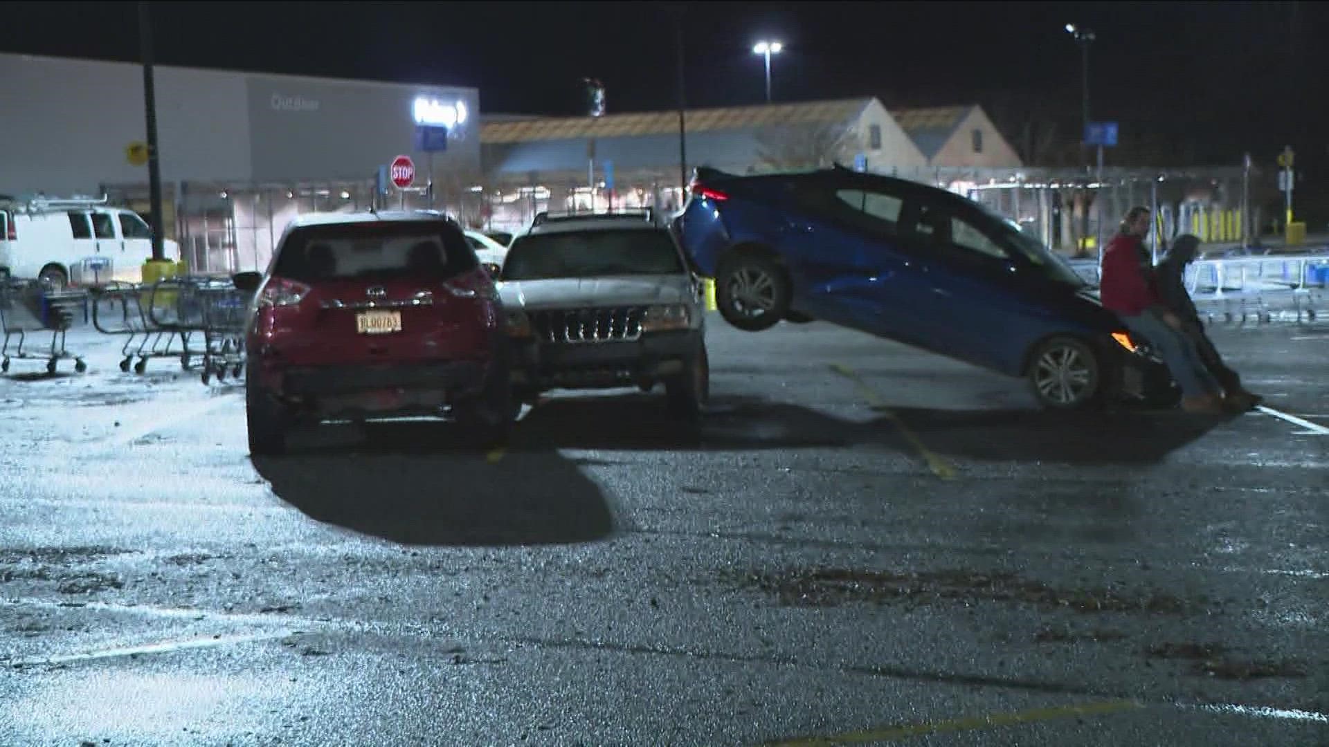 This is along West McIntosh Road in Griffin. The back of one car even sits on another in the parking lot.