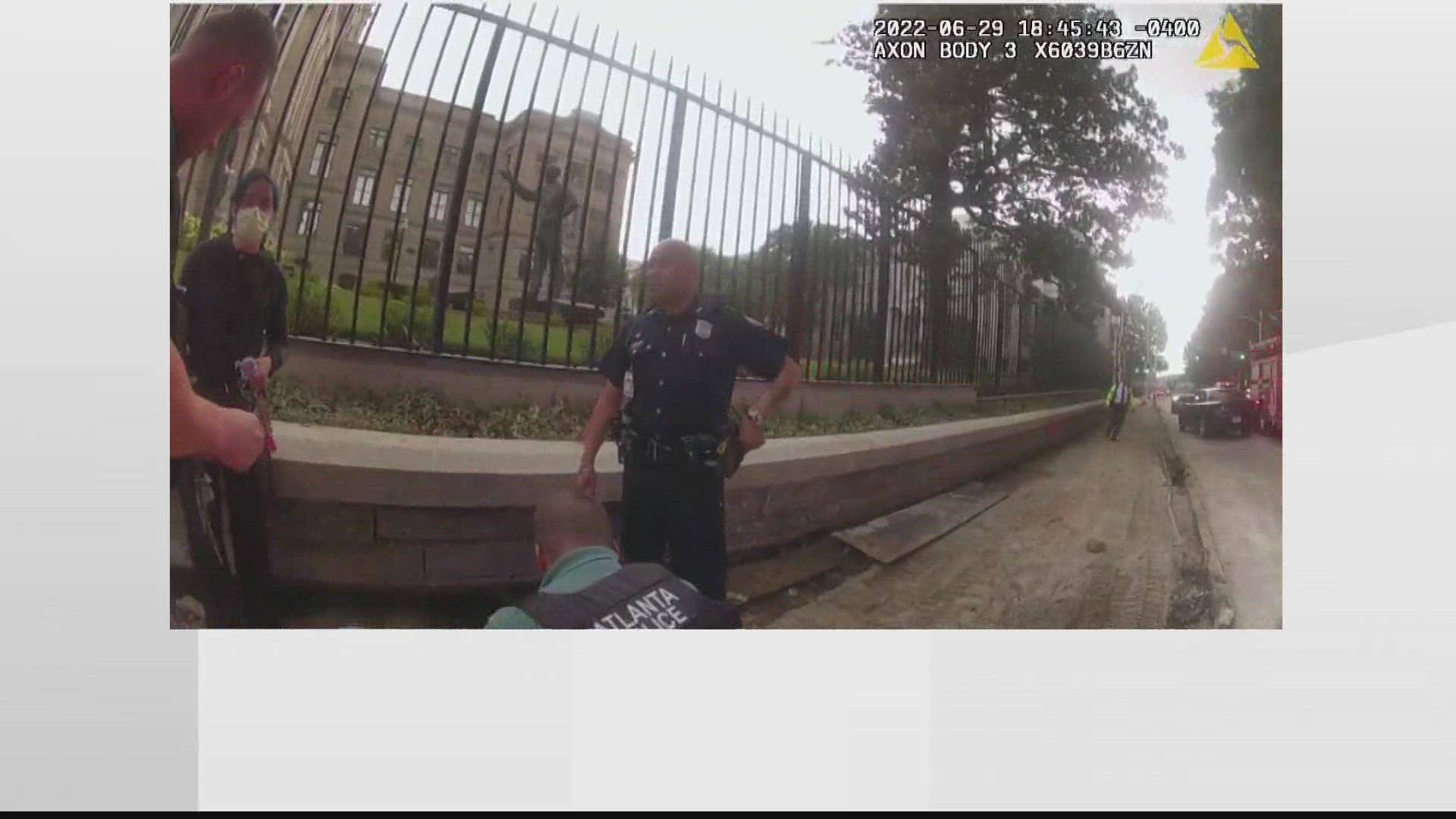 Video from an APD officer's body camera shows the incident unfolding on a street outside the State Capitol building.