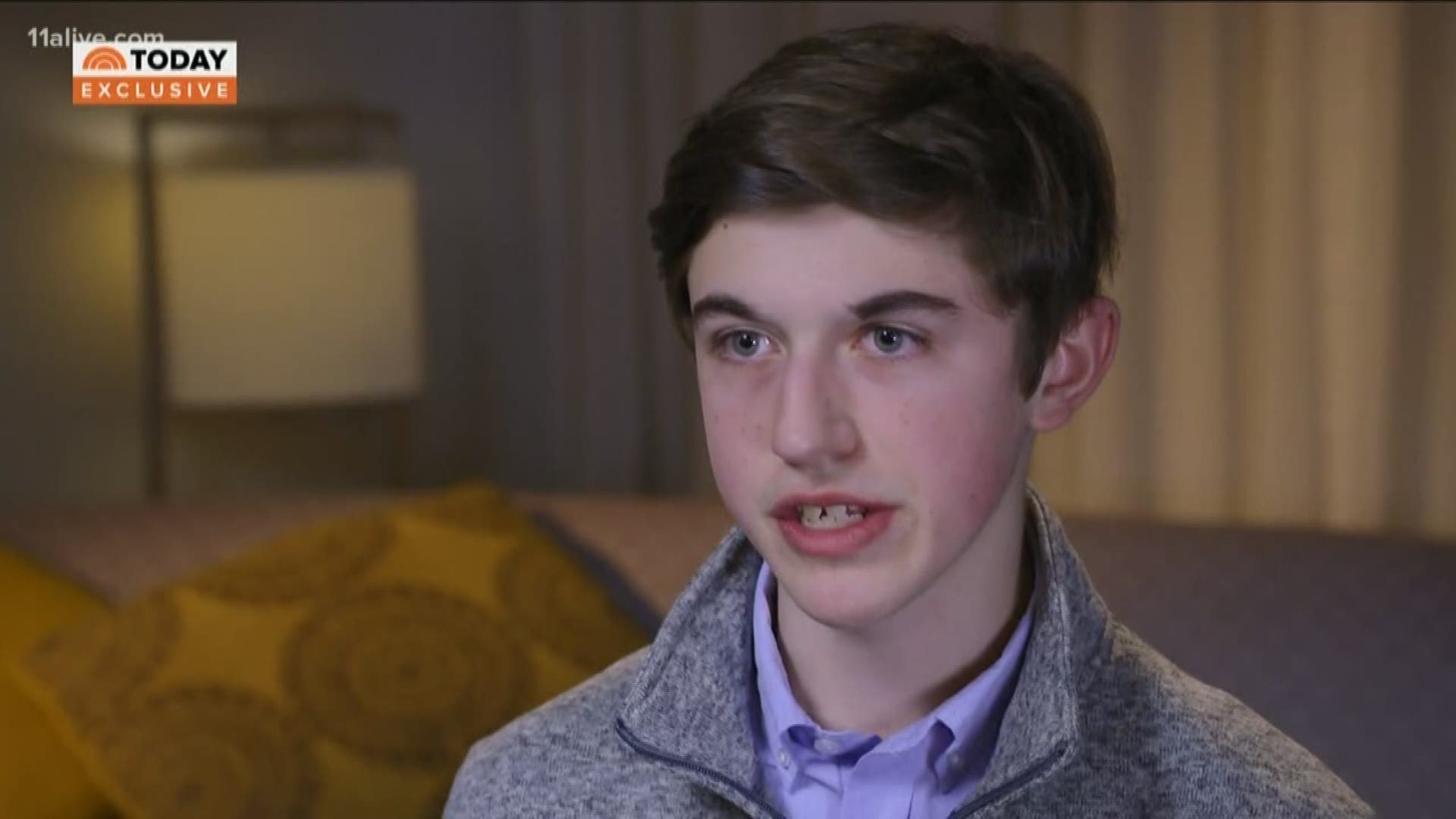 The teen says that a mere expression was mislabeled by many on social media - and by some news outlets. Now his family intends to sue.