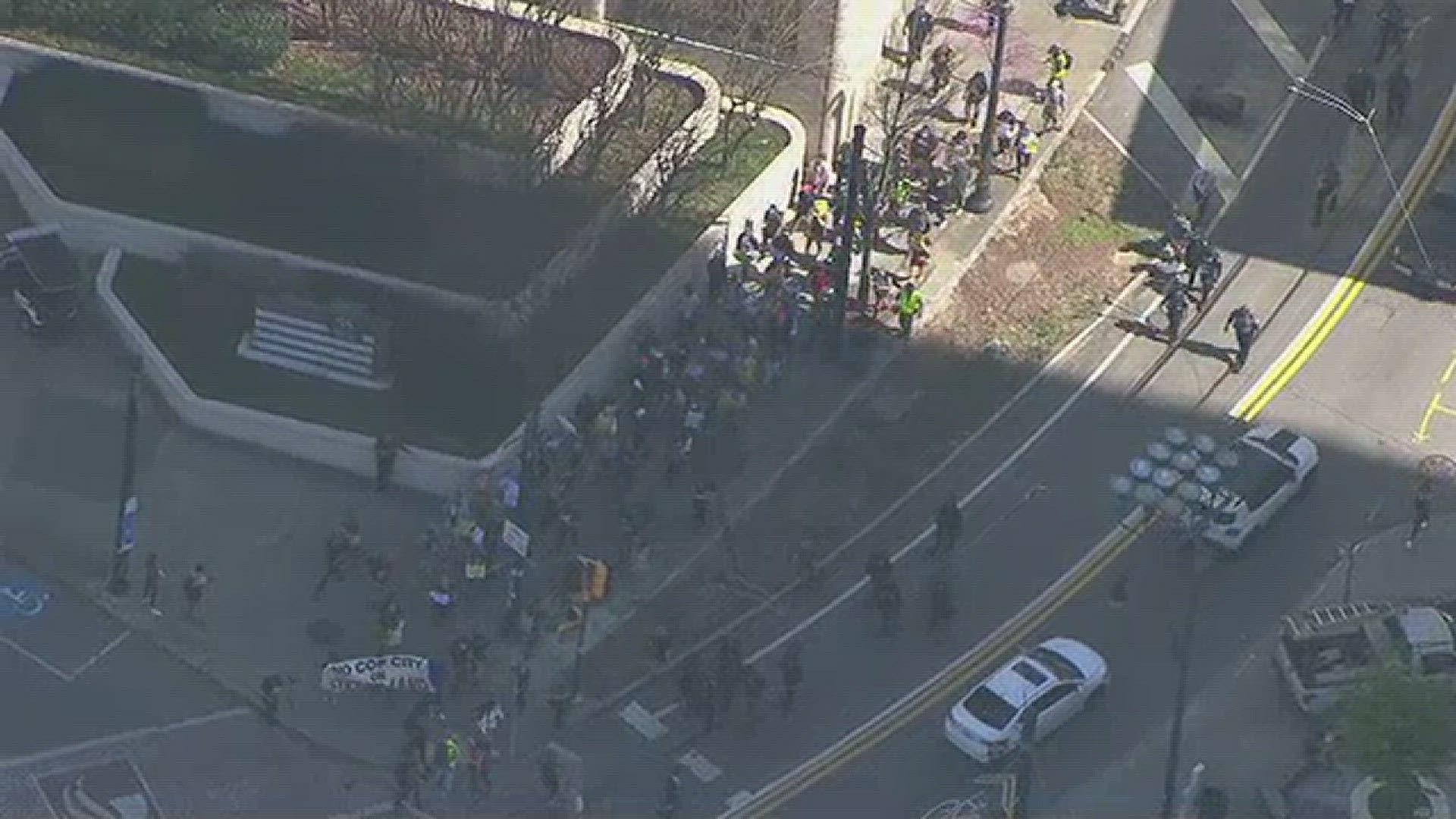 11Alive Skytracker spotted a line of protesters marching in downtown Atlanta on Tuesday, days after multiple activists were arrested over the weekend.