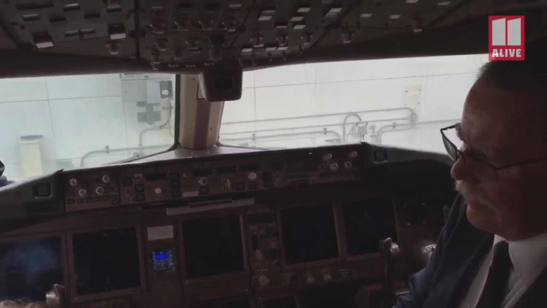 An American Airlines pilot retiring after 35 years gave his wings to a Florida toddler with Down syndrome after his final flight. Video provided by American Airlines