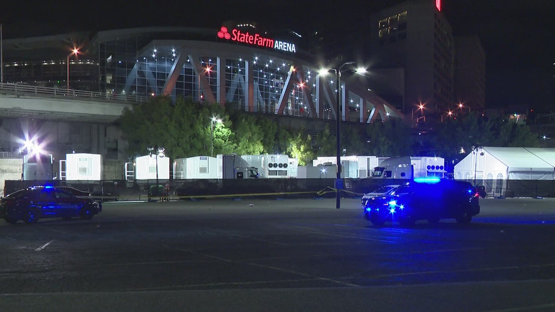 Atlanta police say two men and a woman were leaving the arena and walking to their car when they were shot