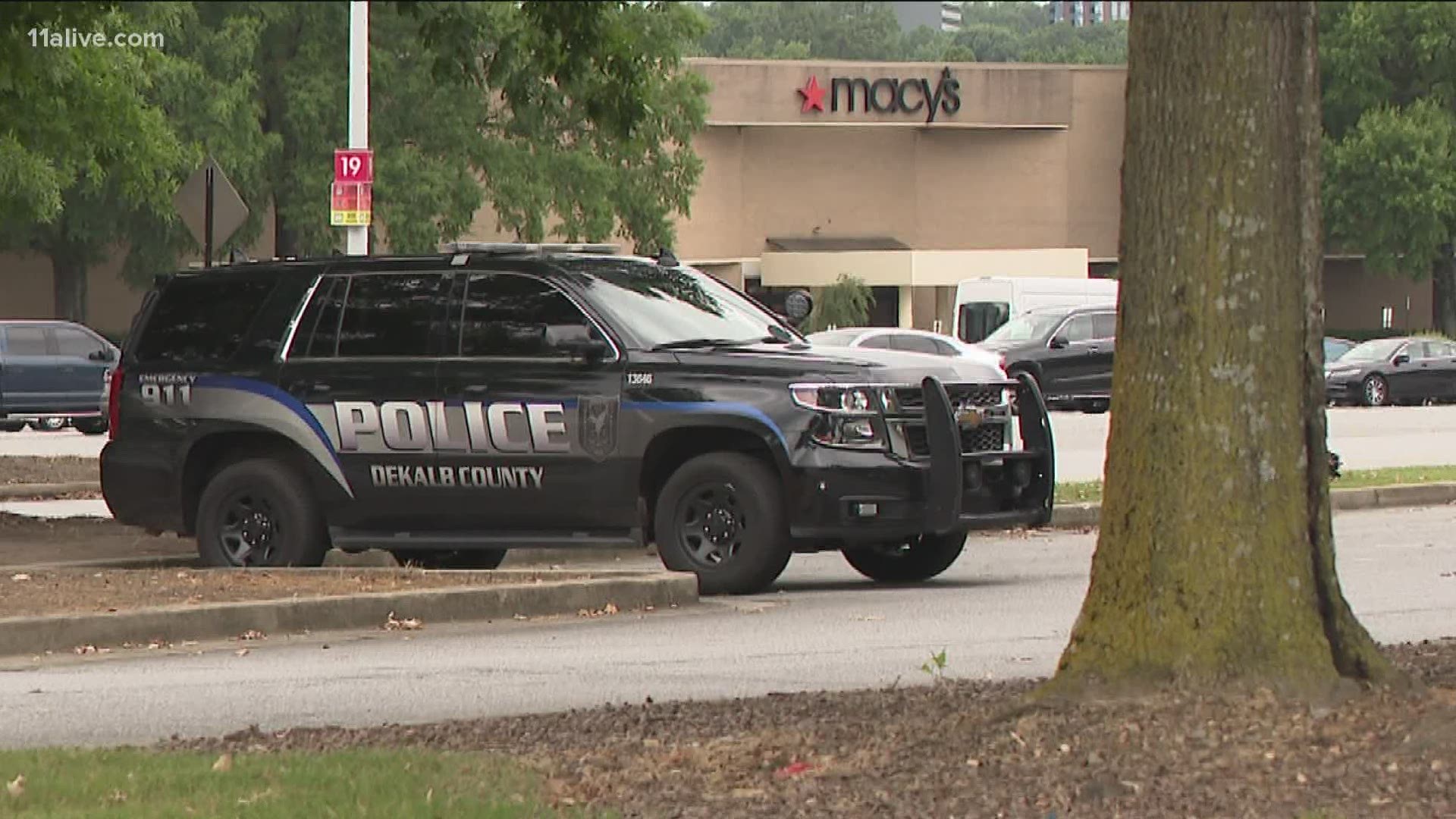 Dunwoody Police said the shoplifter ran out of Macy’s and opened fire in the parking lot when a private security officer followed him outside.