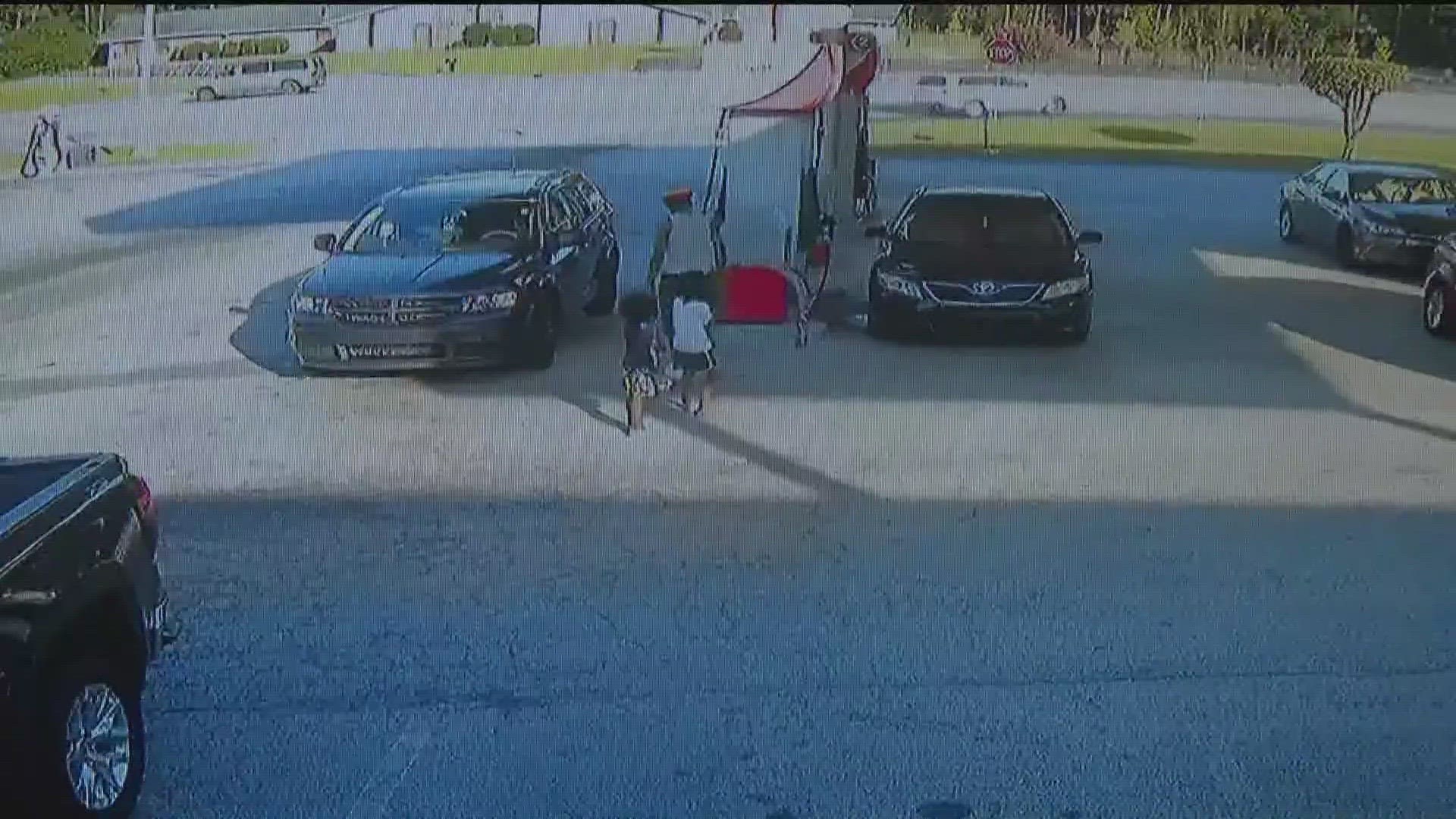 The surveillance video shows the moment Dante Daugherty, 42, left his 6-year-old and 7-year-old sons with a car containing a loaded gun.